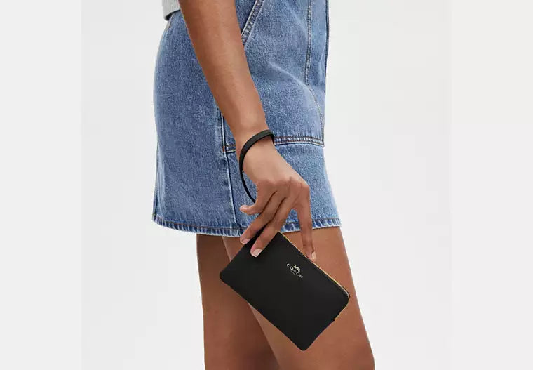 Muñequera Corner Zip Coach